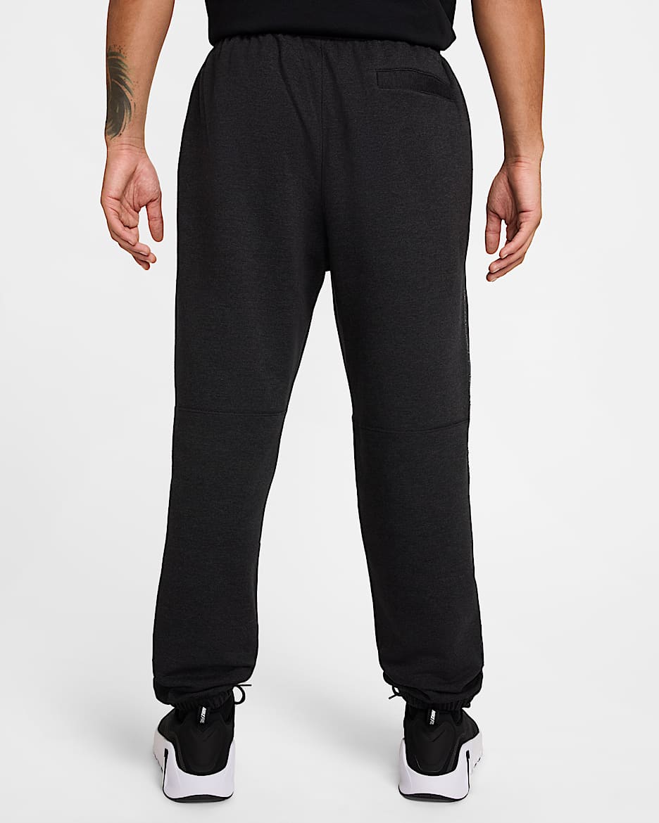Pantaloni da fitness in fleece Dri FIT Nike Gym Heritage Uomo. Nike IT